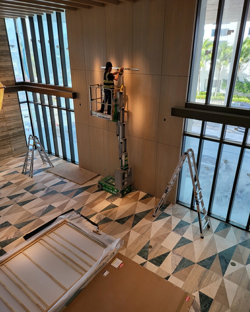 Installation of cleat for massive photograph installation at the Four Seasons, Ft Lauderdale, FL